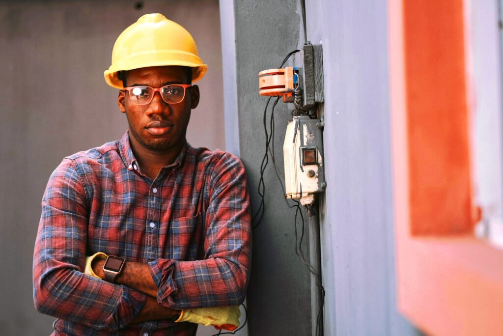 Electrician repairing a light switch